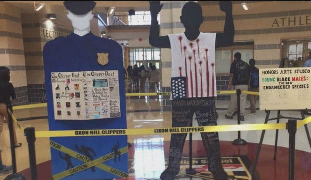 Social justice art display pulled from high school lobby after complaints