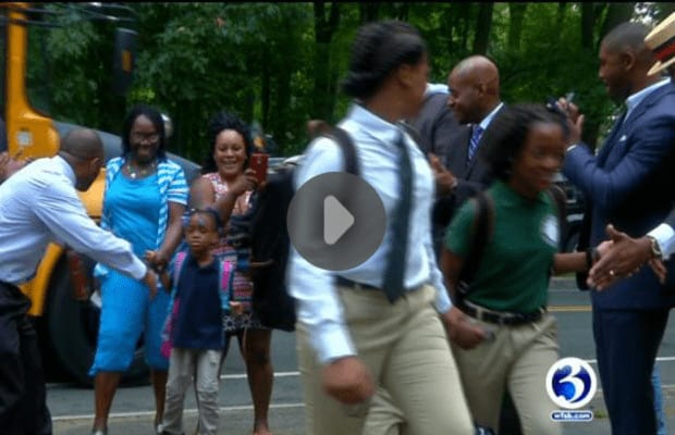 Hartford students return to school with cheers, applause