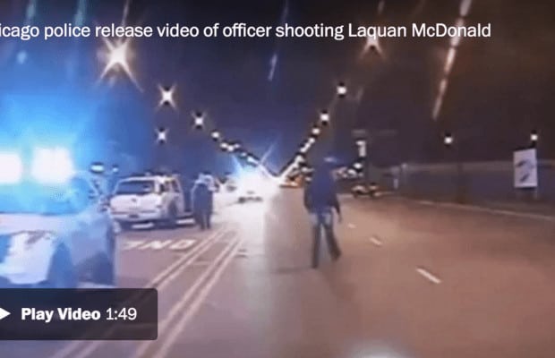 Chicago police officer charged with murder in shooting of black teenager as city releases video footage