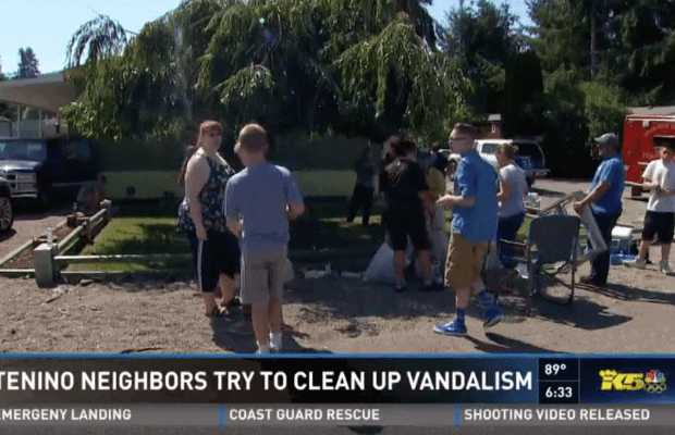 Community Cleans Up ‘KKK’ Graffiti On Family’s Home Before They Return